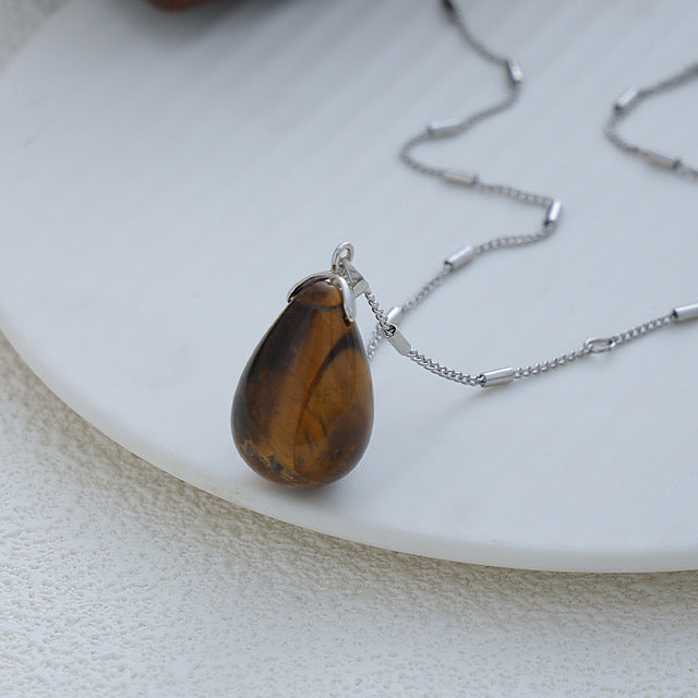 N04 Drop shape tiger's eye + titanium steel necklace