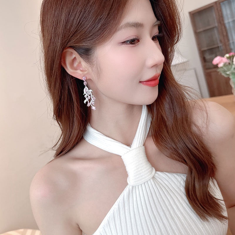 S925 Elegant long - style noble consort - inspired leaf earrings for women, luxurious and high - end, super - shiny zircon ear drop