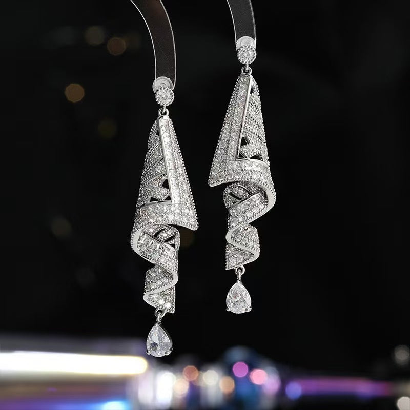 Exquisite S925 Silver Needle Ethnic Earrings with Retro Silk and Jewelry-Style Design